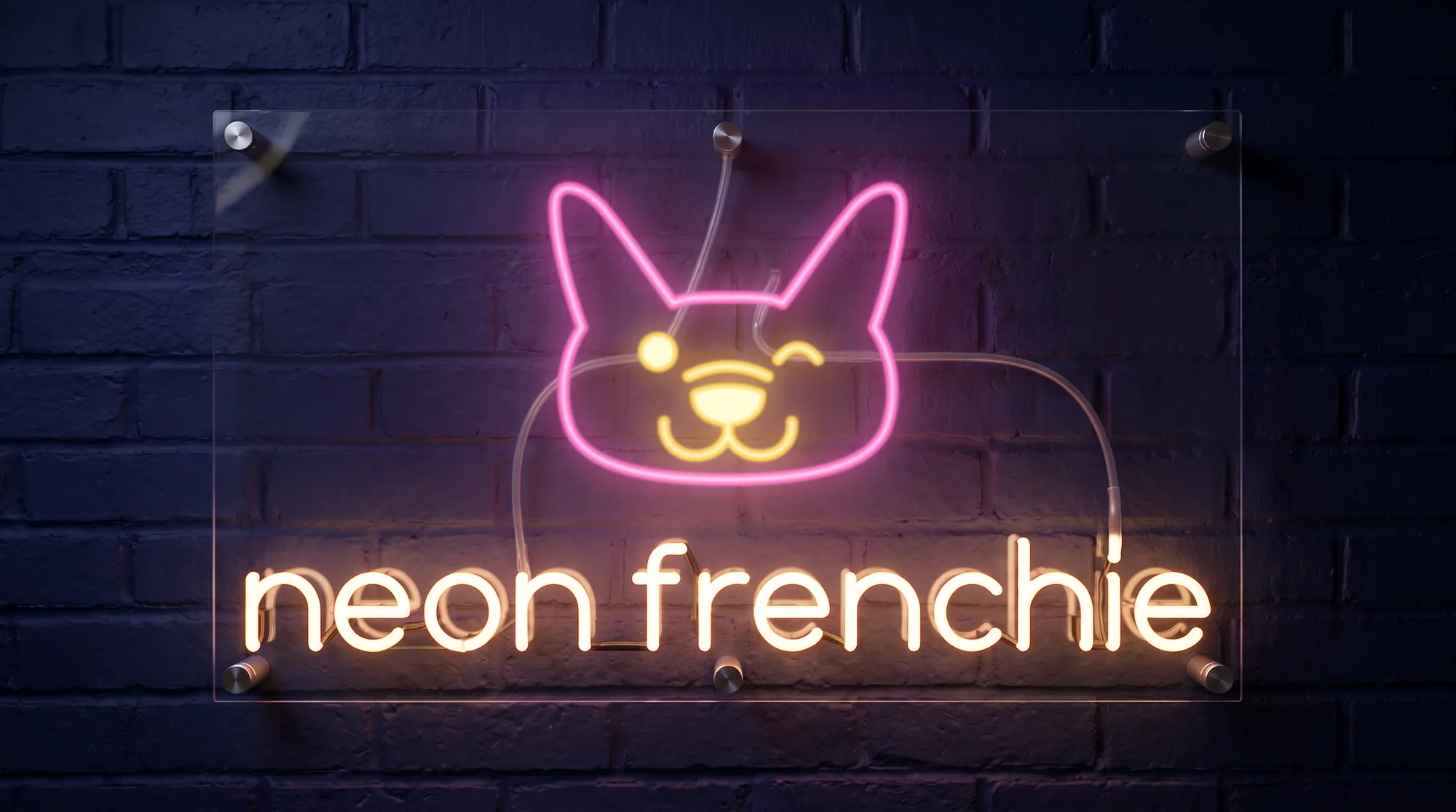 The Neon Frenchie sign: pink and amber glass tubes for the dog and warm white letters on clear acrylic, glowing on a dark brick wall
